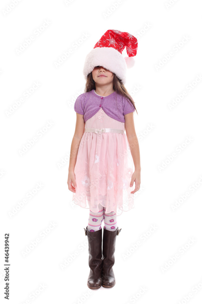 Portrait of happy little girl in Santa hat