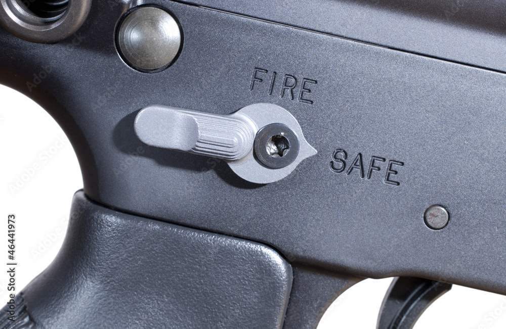 Safety on an assault rifle in the safe position.