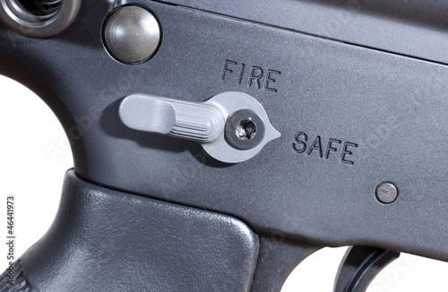 Safety on an assault rifle in the safe position. 
