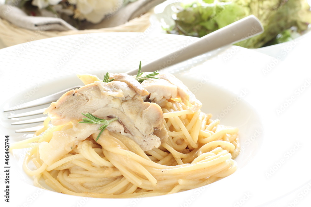 italian cuisine, chicken and cream spaghetti with vegetable sald