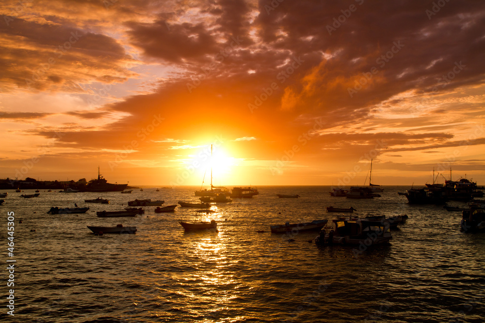 sailing boat sunset at Galapagos Islands Beach