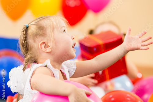 joyful kid girl on birthday...