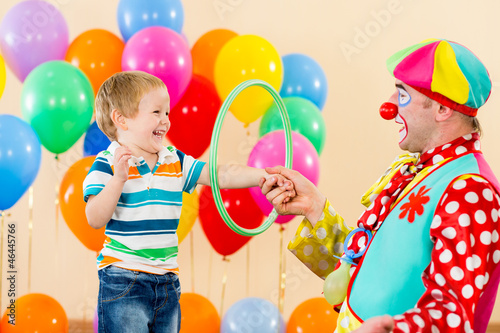 clown amusing kid boy on birthday party