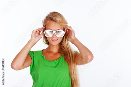 Portrait of beautiful woman posing on white background in glasse
