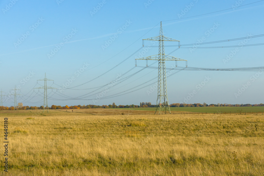 High-voltage line in the field