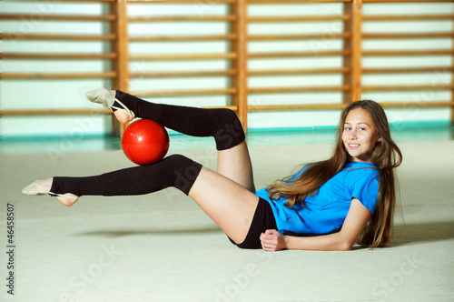 Obraz na plátně Beautiful gymnast with the ball