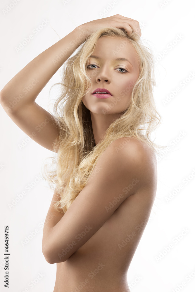pretty blonde girl with naked torso and hand on the head pretty blonde girl with naked torso and hand on the head