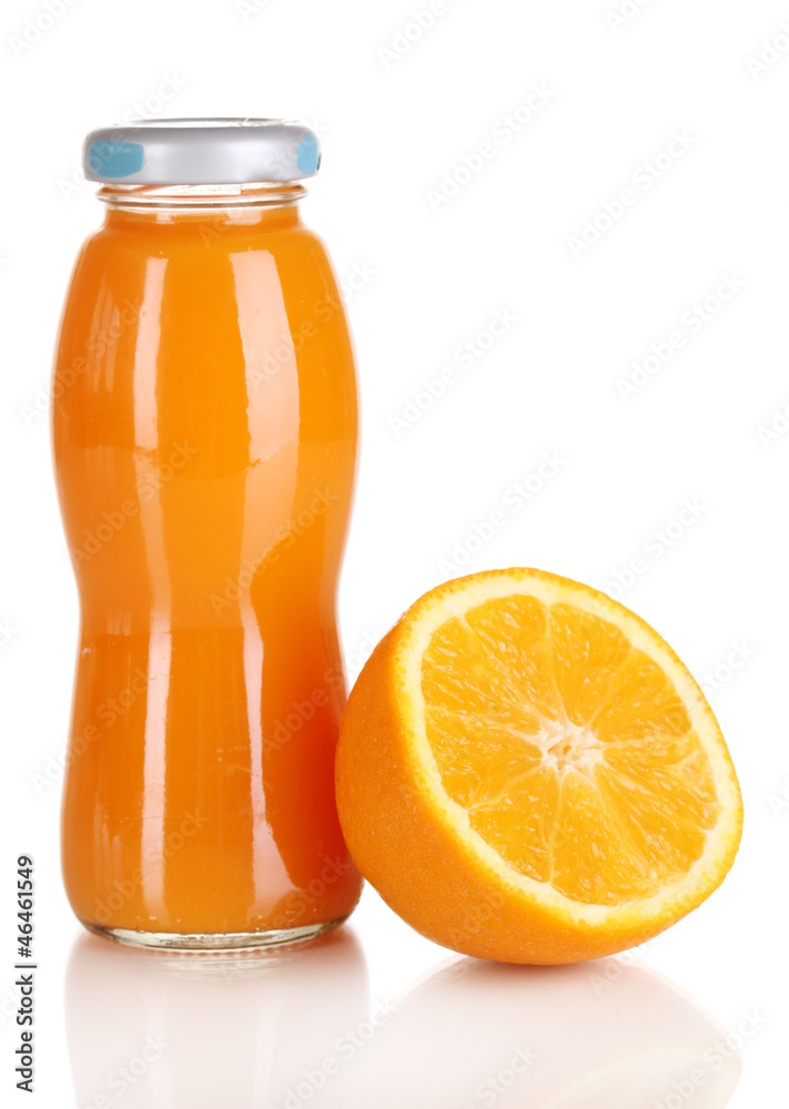 Delicious orange juice in a bottle and orange next to it Delicious orange juice in a bottle and orange next to it