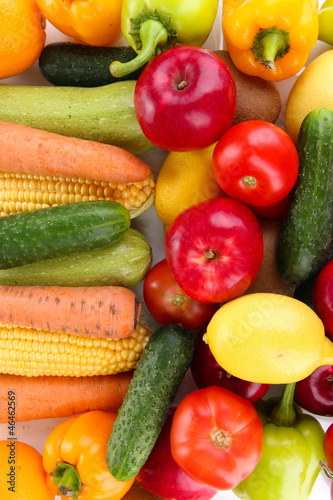 Assortment of fresh vegetables and fruits as a background