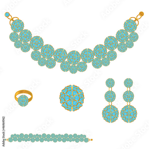 golden set from necklace ring earrings and bracelet
