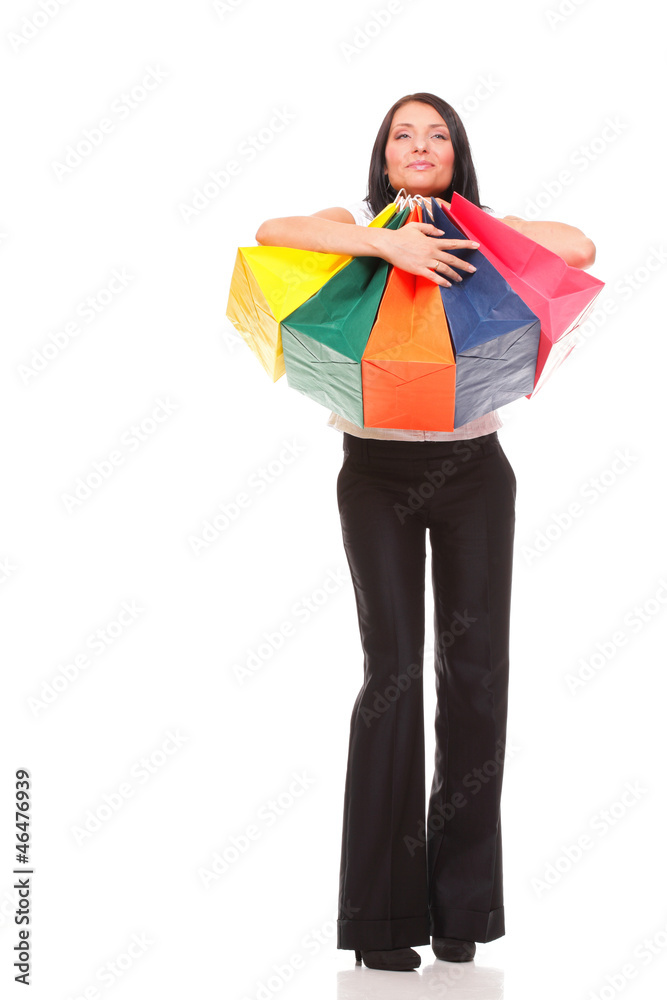 Full body portrait cheerful businesswoman holding shopping bags Full body portrait cheerful businesswoman holding shopping bags