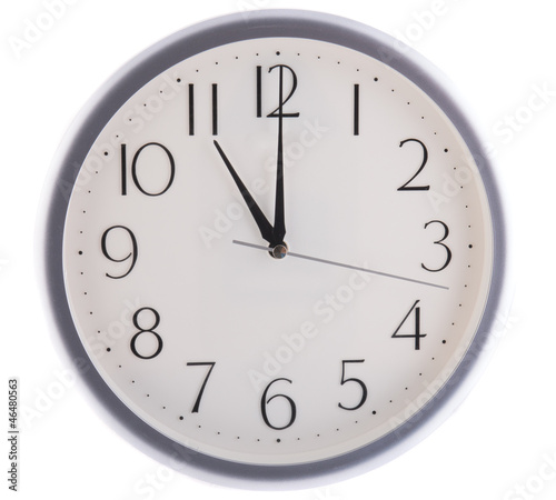 isolated white clock at eleven