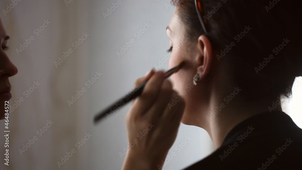 Model making-up for photography in studio. Model making-up for photography in studio.