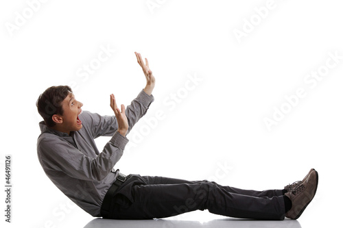 Tableau sur toile Scared young businessman