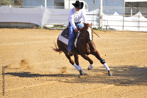 Man riding a horse in competition