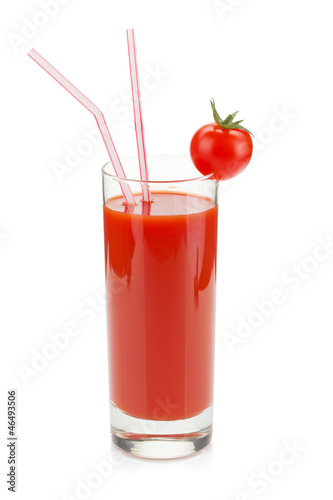 Tomato juice in a glass with drinking straw