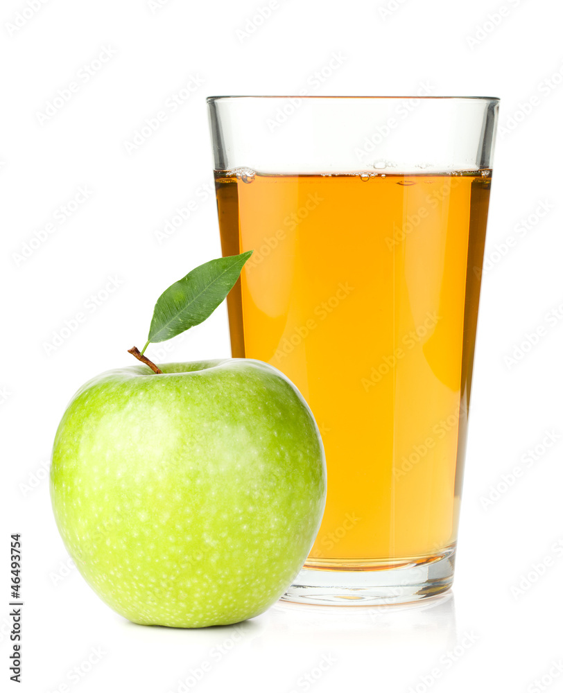 Apple juice in a glass and green apple Apple juice in a glass and green apple