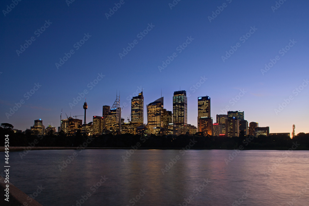 Skyline View of Sydney at dawn seen from the botanical gardens