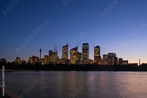 Skyline View of Sydney at dawn seen from the botanical gardens