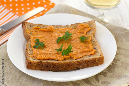 toast with salmon spread and parsley on the plate