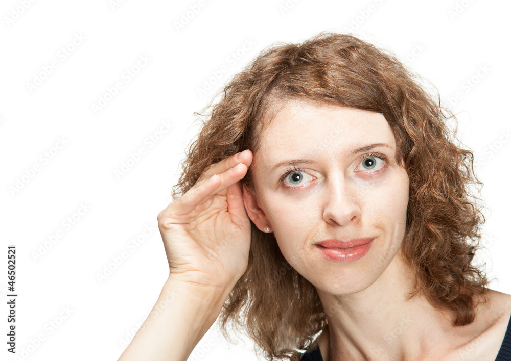 Fototapeta premium Young woman trying to hear something; woman overheas something