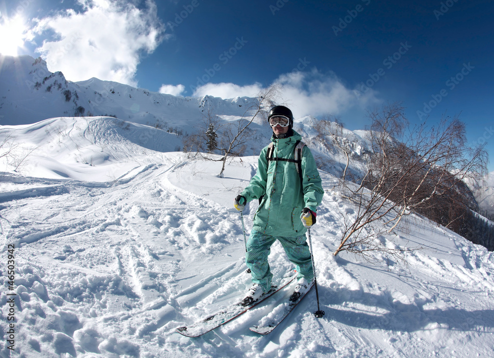 Skier in the mountains at Krasnaya Polyana