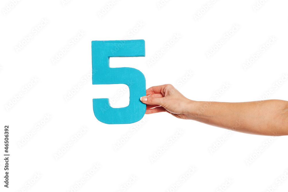 hand holding up the number five from the right hand holding up the number five from the right
