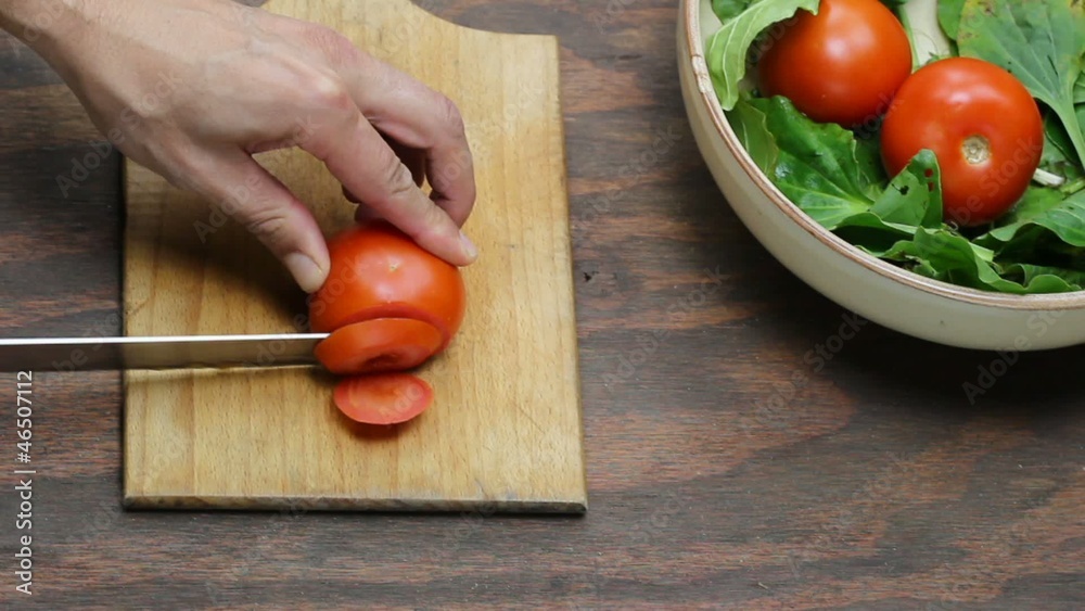 tomatoes on slicing board