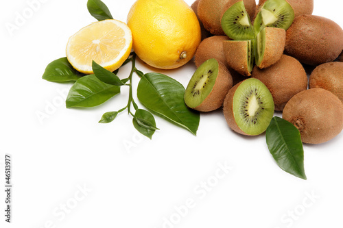 Fresh fruit. Kiwi and lemon isolated on a white background.