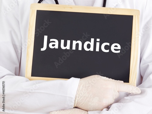 Doctor shows information on blackboard: jaundice photo