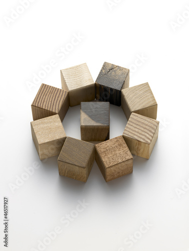 various wooden cubes on a white background