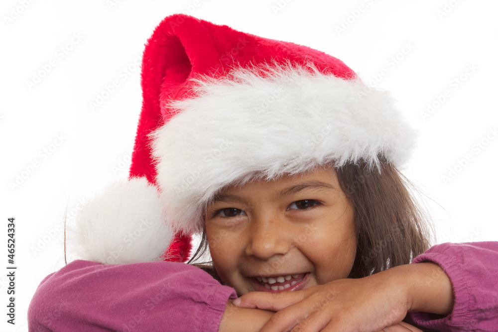 enfant avec bonnet de noël regarde le père noël enfant avec bonnet de noël regarde le père noël