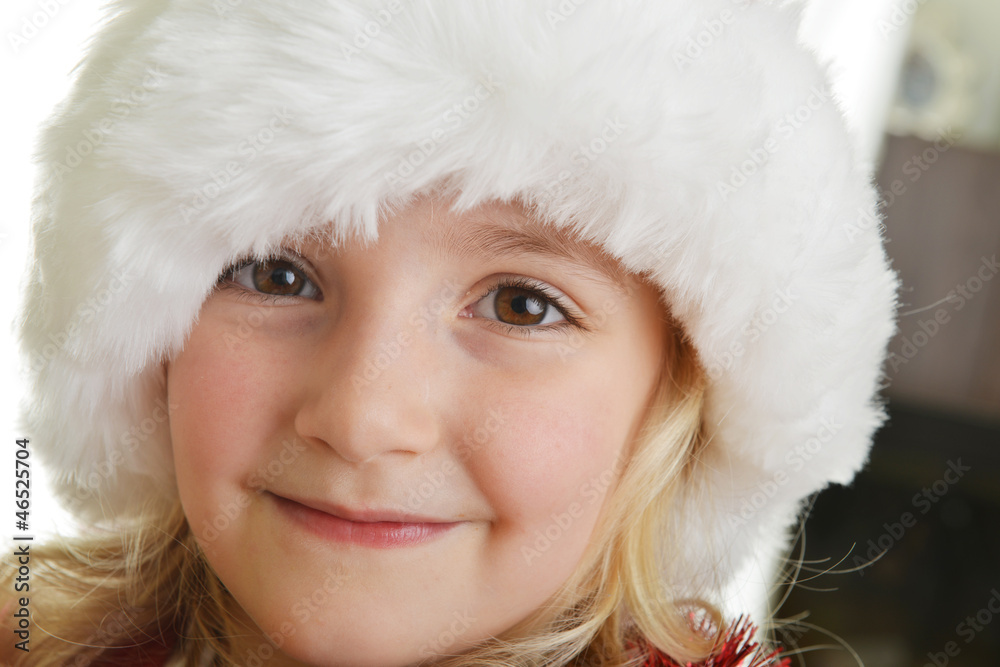 girl in santa cap girl in santa cap