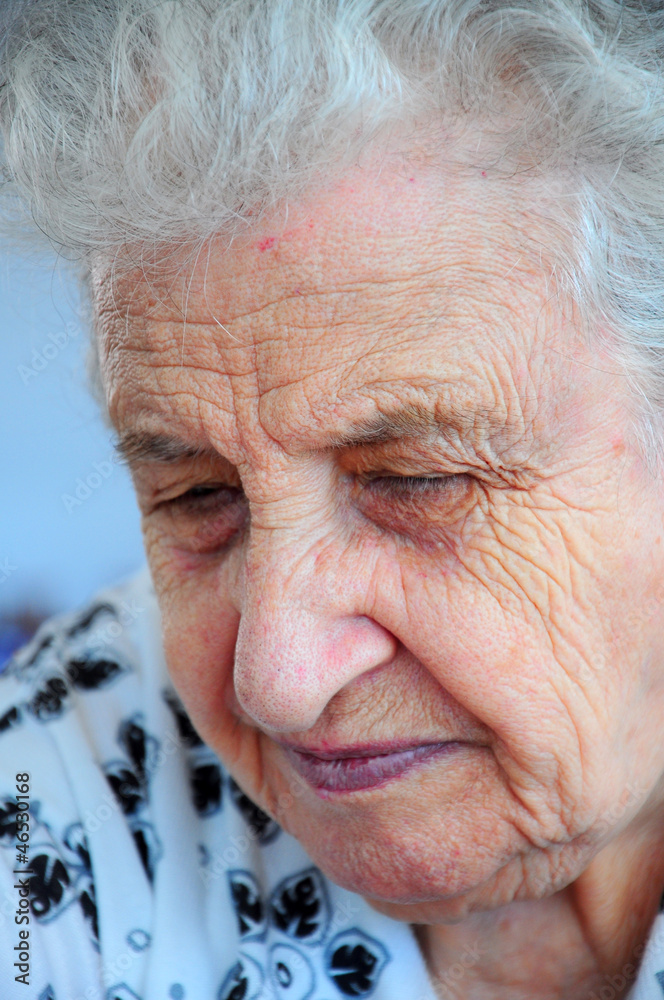 Closeup portrait of tired and sad senior woman Closeup portrait of tired and sad senior woman