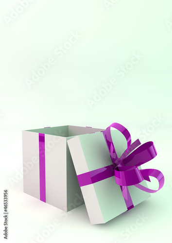 White gift boxes with purple ribbons