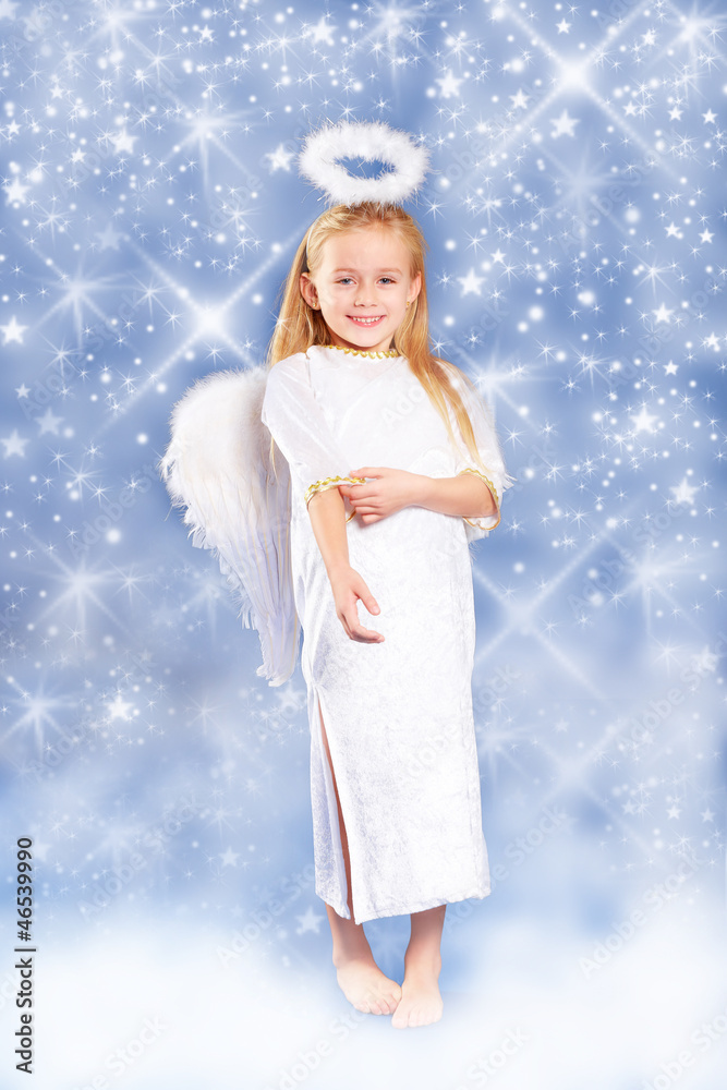 Christmas angel with sparkling stars on a cloud Christmas angel with sparkling stars on a cloud