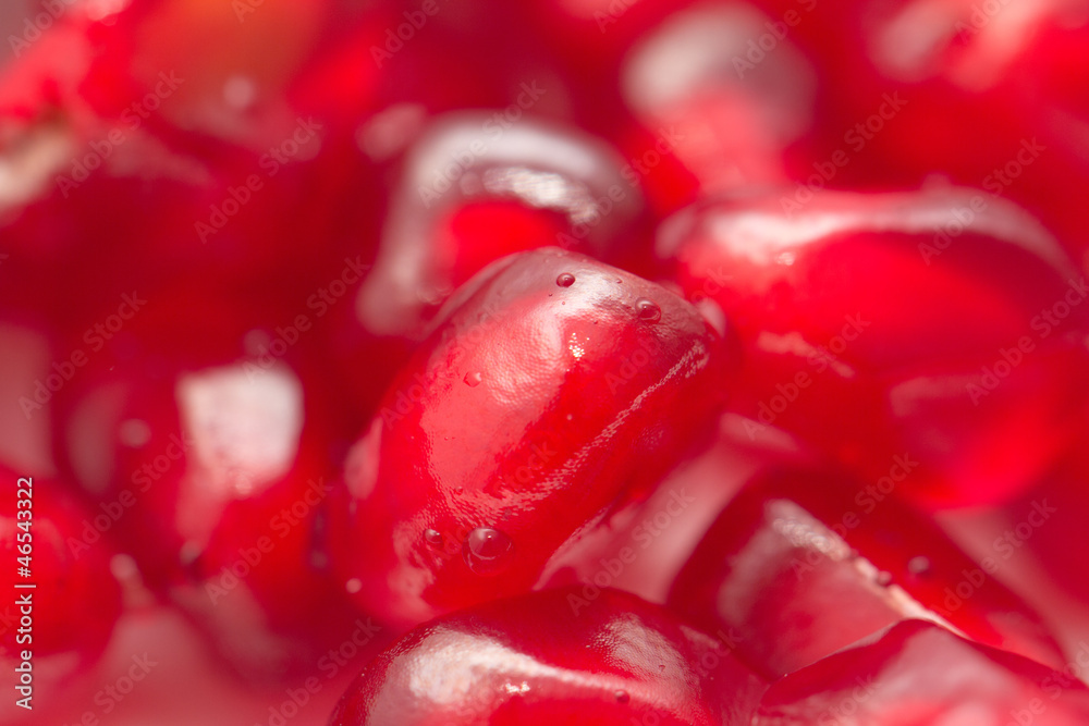 fresh red juicy pomegranate . macro fresh red juicy pomegranate . macro