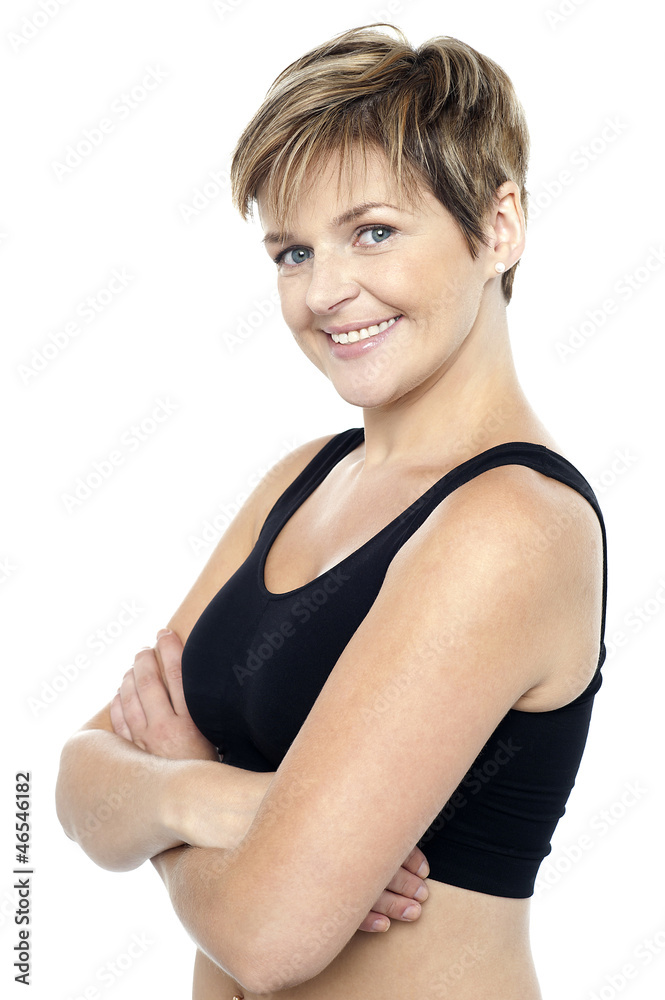 Confident middle-aged female instructor