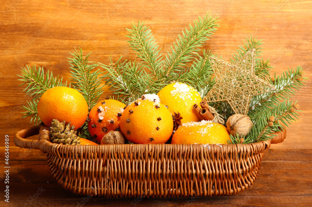 christmas composition in basket with oranges and fir tree, christmas composition in basket with oranges and fir tree,