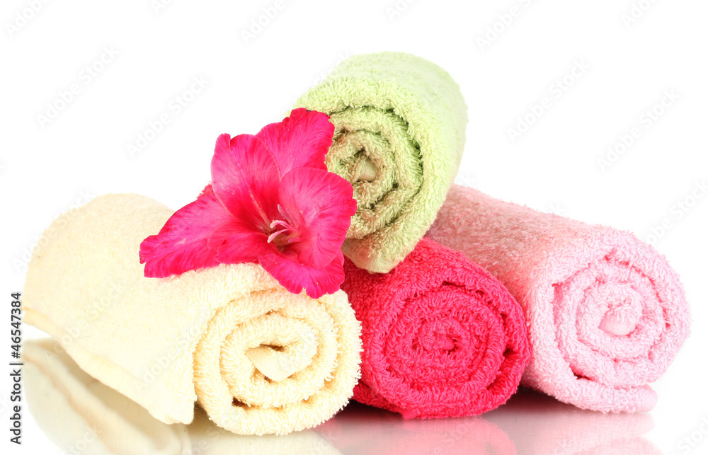 bright towels and flower isolated on white bright towels and flower isolated on white