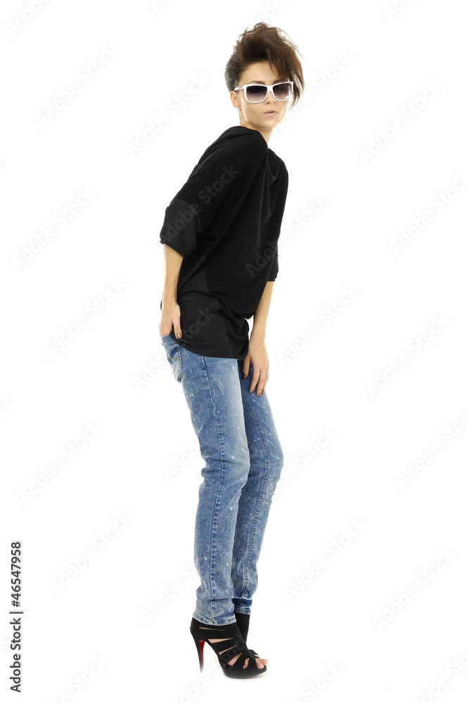 Full length casual picture of young woman in blue jeans Full length casual picture of young woman in blue jeans