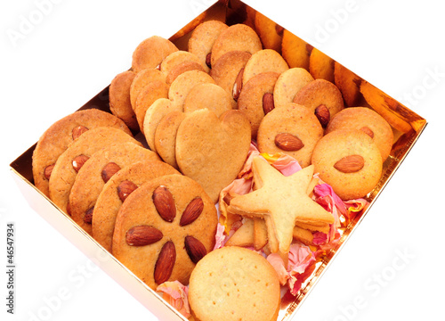 Wallpaper Mural Assorted biscuits in a gold box, isolated on white background. Torontodigital.ca