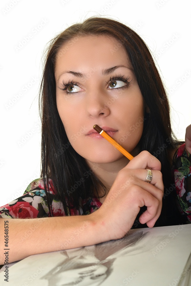 beautiful young woman painting