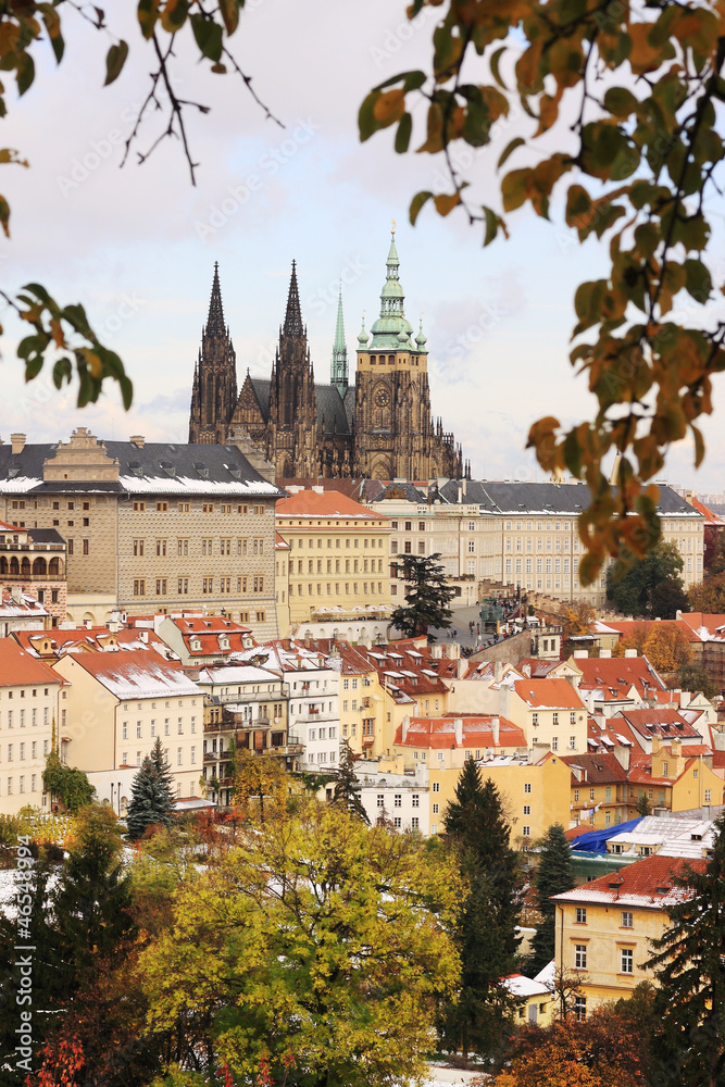 Snowy colorful autumn Prague gothic Castle, Czech Republic