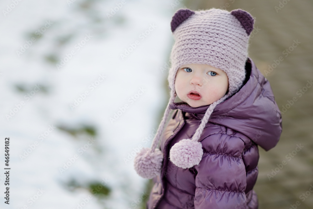 Little girl portrait in a city
