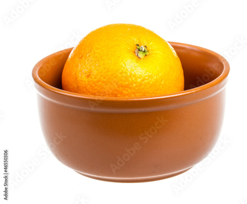 Heap of oranges in the dish