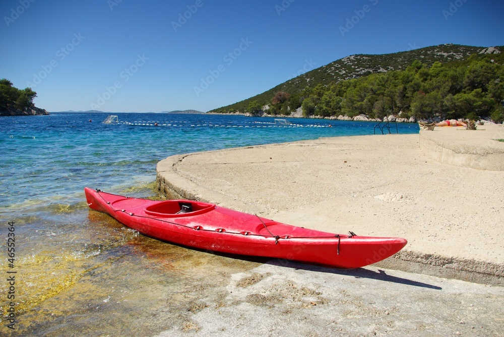 Kayak on the shore of the turquoise sea, Croatia Dalmatia