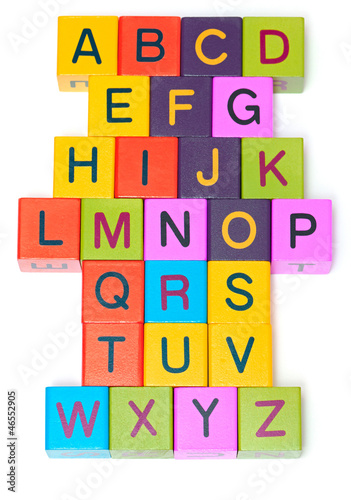 Wooden blocks with letters on white background