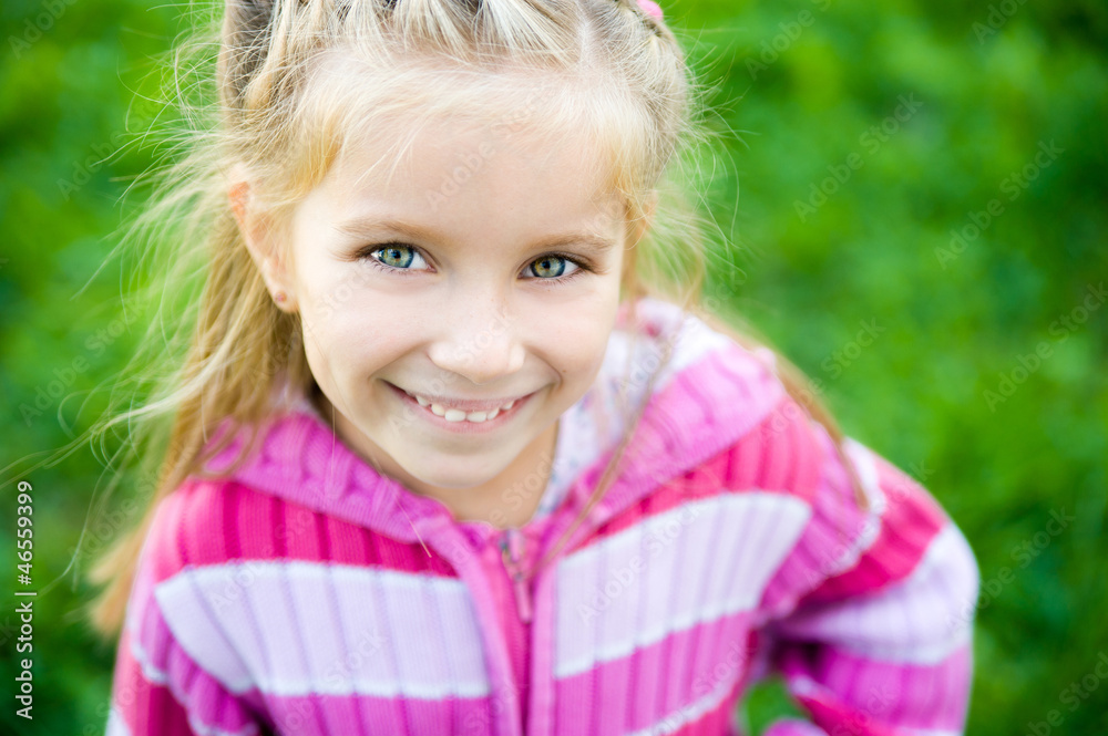 smiling liitle girl close-up smiling liitle girl close-up