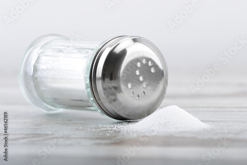 Salt being poured out of a salt shaker